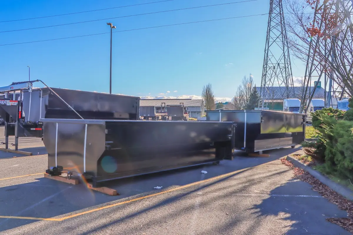 Roll-off dumpster ready for waste disposal at job site for 12 Yard Dumpster Rental in Laketown